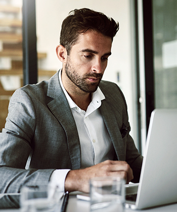 man working with a laptop